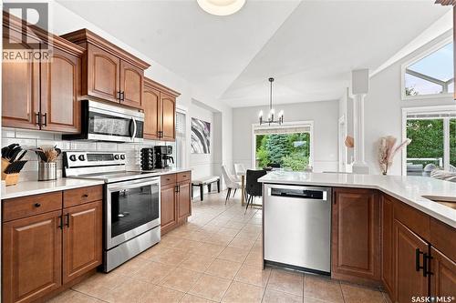 102 Brookdale Crescent, Saskatoon, SK - Indoor Photo Showing Kitchen With Double Sink