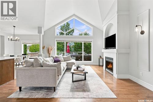 102 Brookdale Crescent, Saskatoon, SK - Indoor Photo Showing Living Room With Fireplace