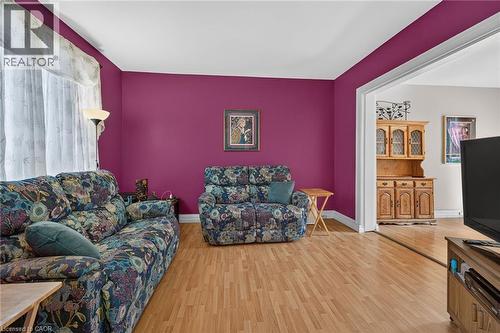Wood-finish flooring throughout - 230 Picton Street E, Hamilton, ON - Indoor Photo Showing Living Room