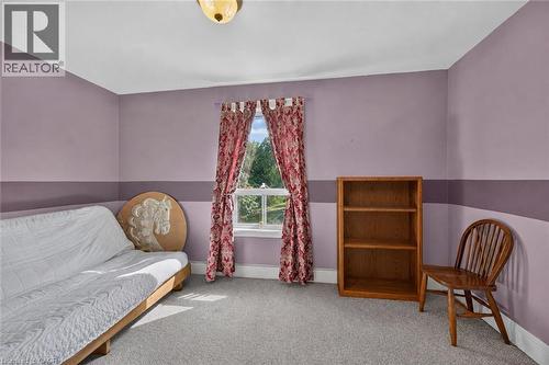 Carpeted flooring with a window featuring exterior scenery - 230 Picton Street E, Hamilton, ON - Indoor