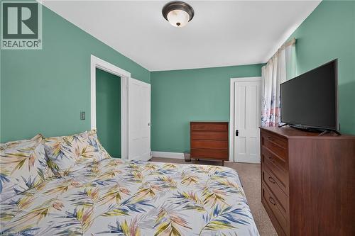 Recessed ceiling light fixture, white trim, and light-colored carpeting - 230 Picton Street E, Hamilton, ON - Indoor Photo Showing Bedroom