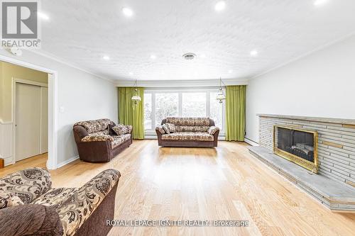 Main - 83 Deep Dene Drive, Toronto, ON - Indoor Photo Showing Living Room With Fireplace