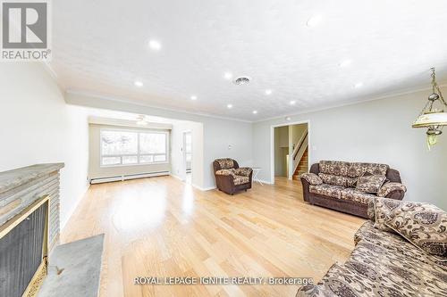 Main - 83 Deep Dene Drive, Toronto, ON - Indoor Photo Showing Living Room With Fireplace