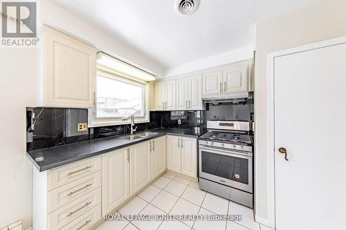 Main - 83 Deep Dene Drive, Toronto, ON - Indoor Photo Showing Kitchen With Double Sink