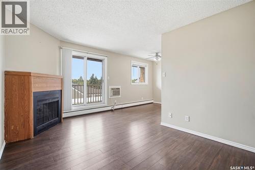 308 203 Tait Place, Saskatoon, SK - Indoor With Fireplace