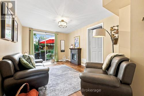 89 - 2 Sir Lou Drive, Brampton, ON - Indoor Photo Showing Living Room With Fireplace