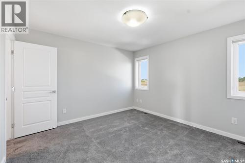 812 1St Avenue N, Warman, SK - Indoor Photo Showing Other Room