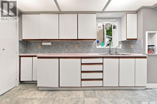 3208 Victoria Avenue, Regina, SK - Indoor Photo Showing Kitchen With Double Sink