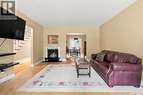 3208 Victoria Avenue, Regina, SK - Indoor Photo Showing Living Room With Fireplace