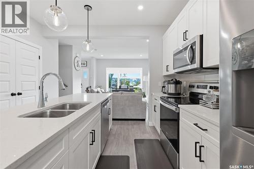 258 Brighton Boulevard, Saskatoon, SK - Indoor Photo Showing Kitchen With Double Sink With Upgraded Kitchen