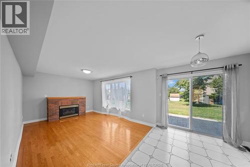 4629 Tournament, Windsor, ON - Indoor Photo Showing Living Room With Fireplace