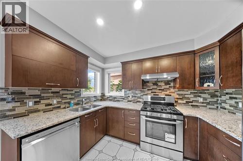 4629 Tournament, Windsor, ON - Indoor Photo Showing Kitchen With Double Sink