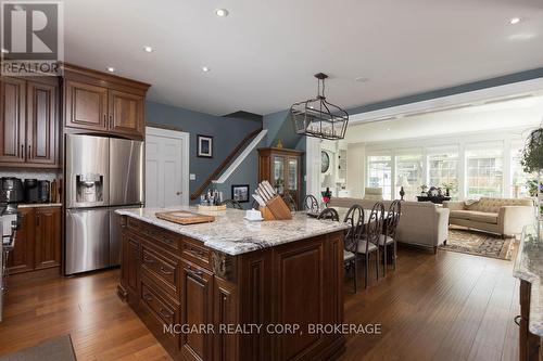 Open kitchen + sun filled family room - 38 Yates Street, St. Catharines (Downtown), ON - Indoor Photo Showing Other Room