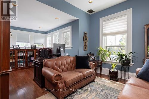 Bright den with built-in bookcases - 38 Yates Street, St. Catharines (Downtown), ON - Indoor Photo Showing Living Room