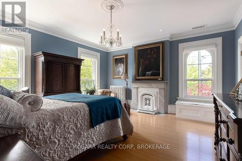 Stunning wood floors and light filled - 38 Yates Street, St. Catharines (Downtown), ON - Indoor Photo Showing Bedroom