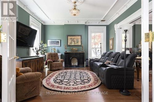 Front living/media room - 38 Yates Street, St. Catharines (Downtown), ON - Indoor Photo Showing Living Room With Fireplace