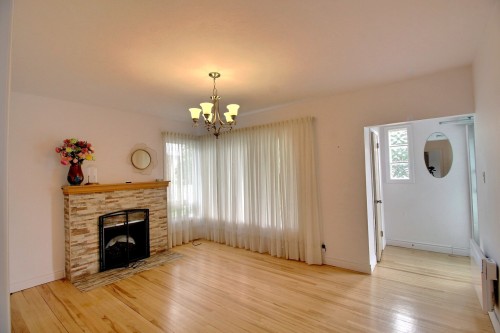 Living Room - 575 Rue Perreault E., Rouyn-Noranda, QC - Indoor Photo Showing Living Room With Fireplace