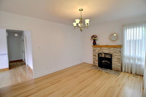 Living Room - 575 Rue Perreault E., Rouyn-Noranda, QC - Indoor Photo Showing Living Room With Fireplace