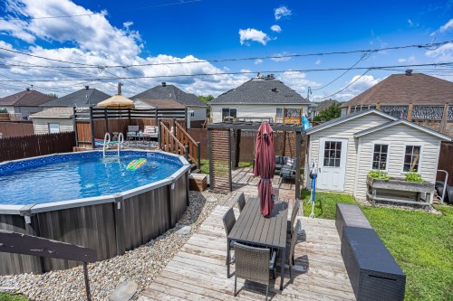 Courtyard - 1916 Rue Jacques-Blanchet, Saint-Jérôme, QC - Outdoor With Above Ground Pool With Deck Patio Veranda