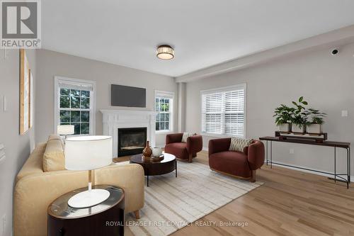43 Vanderpost Crescent, Essa, ON - Indoor Photo Showing Living Room With Fireplace