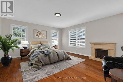 43 Vanderpost Crescent, Essa, ON - Indoor Photo Showing Bedroom With Fireplace