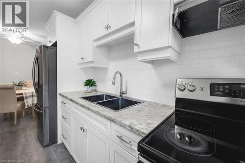 9 Grant Boulevard Unit# 107, Dundas, ON - Indoor Photo Showing Kitchen With Double Sink With Upgraded Kitchen