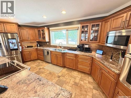 3 Mclelland Bay, Weyburn, SK - Indoor Photo Showing Kitchen With Double Sink