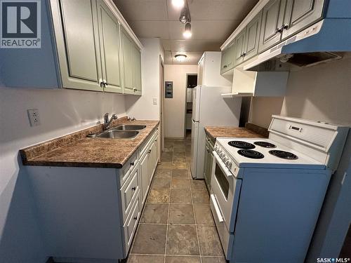 113 3Rd Street E, St. Walburg, SK - Indoor Photo Showing Kitchen With Double Sink