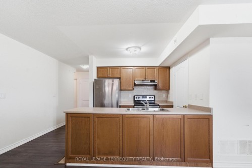 3-141 Isaac Devins Boulevard, Toronto, ON - Indoor Photo Showing Kitchen With Double Sink