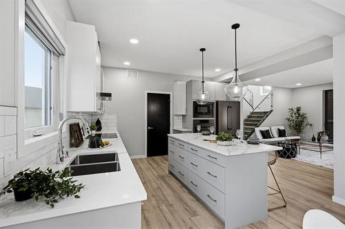 328 River Trail Dr, West St Paul, MB - Indoor Photo Showing Kitchen With Double Sink With Upgraded Kitchen