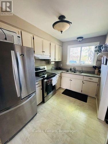#20 - 41 Rhonda Road, Guelph (Willow West/Sugarbush/West Acres), ON - Indoor Photo Showing Kitchen With Double Sink