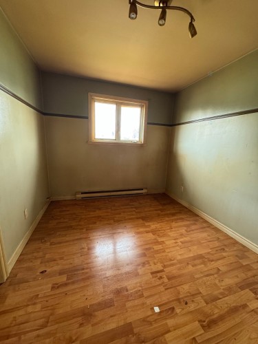 Chambre à coucher - 18 Rue Thibault, Sept-Îles, QC - Indoor Photo Showing Other Room