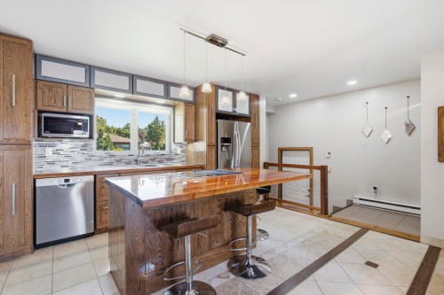 Cuisine - 138 45E Avenue, Saint-Eustache, QC - Indoor Photo Showing Kitchen With Upgraded Kitchen