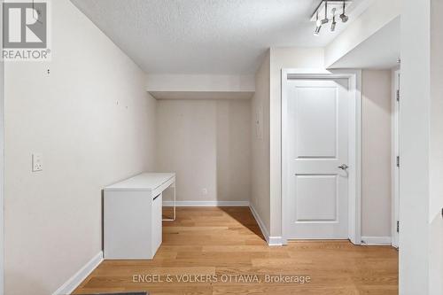 This image has been virtually staged. - 604 - 138 Somerset Street W, Ottawa, ON - Indoor Photo Showing Other Room