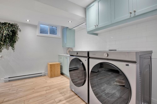 Salle de bains - 21 Av. Balzac, Candiac, QC - Indoor Photo Showing Laundry Room