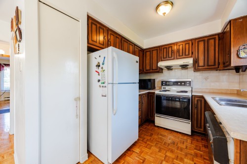 Kitchen - 7683 Place Trahan, Brossard, QC - Indoor Photo Showing Kitchen With Double Sink