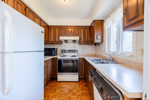 Kitchen - 7683 Place Trahan, Brossard, QC - Indoor Photo Showing Kitchen With Double Sink