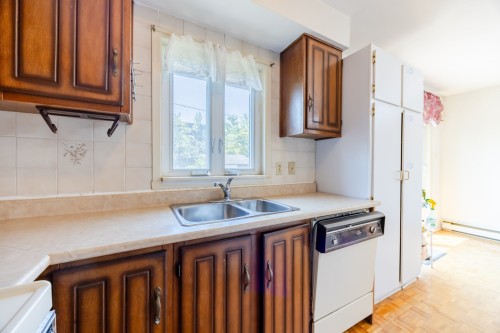 Kitchen - 7683 Place Trahan, Brossard, QC - Indoor Photo Showing Kitchen With Double Sink