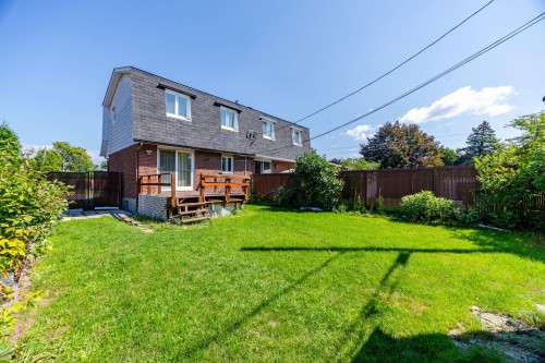 Back of Structure - 7683 Place Trahan, Brossard, QC - Outdoor With Deck Patio Veranda