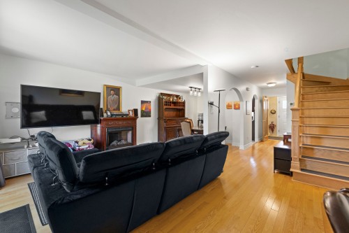 Vue d'ensemble - 4562Z Rue Lake, Dollard-Des-Ormeaux, QC - Indoor With Fireplace