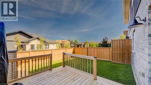 Edited using AI to remove play centre - not included - 117 Sarah Road, Mount Forest, ON - Outdoor With Deck Patio Veranda