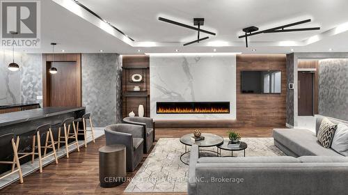2919 - 275 Village Green Square, Toronto, ON - Indoor Photo Showing Other Room With Fireplace