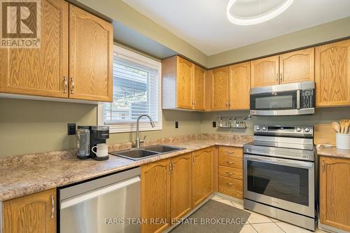 4 Bluegrass Drive, Barrie, ON - Indoor Photo Showing Kitchen With Double Sink