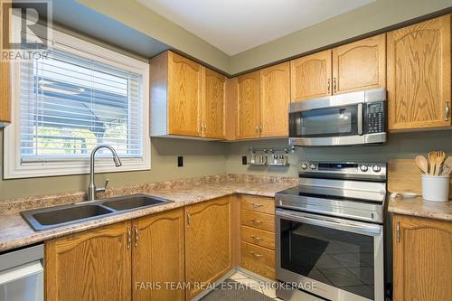 4 Bluegrass Drive, Barrie, ON - Indoor Photo Showing Kitchen With Double Sink
