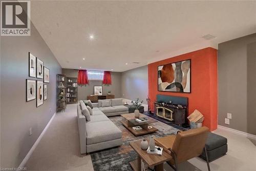 Recessed lighting illuminates the space - 251 Union Street E, Waterloo, ON - Indoor Photo Showing Living Room With Fireplace