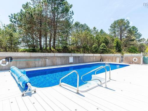 802 99 Waterfront Drive, Bedford, NS - Outdoor With In Ground Pool With Backyard