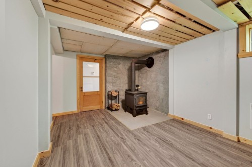 Salle familiale - 1680 Rue Bert, Prévost, QC - Indoor With Fireplace