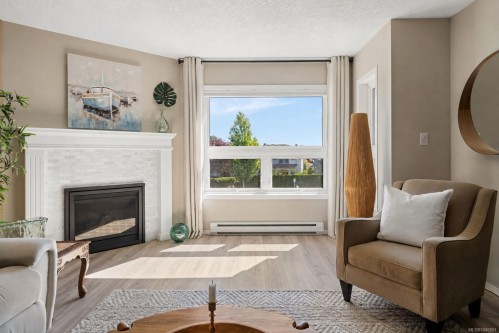 #310-9650 First St, Sidney, BC - Indoor Photo Showing Living Room With Fireplace