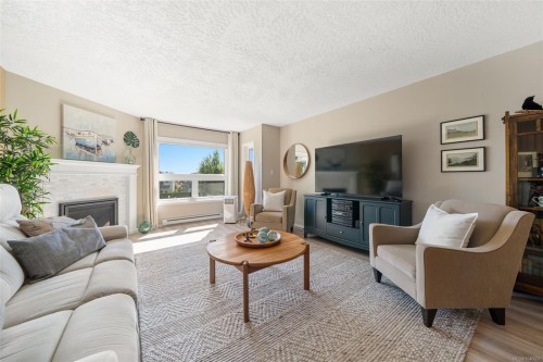 #310-9650 First St, Sidney, BC - Indoor Photo Showing Living Room With Fireplace