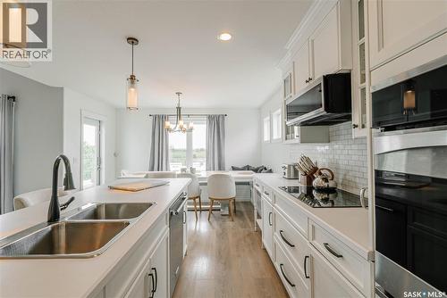 400 Stone Terrace, Martensville, SK - Indoor Photo Showing Kitchen With Double Sink With Upgraded Kitchen